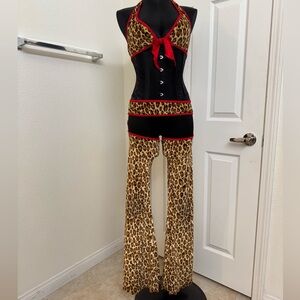 Hot girl dance wear leopard print chaps and tie top, red trim.